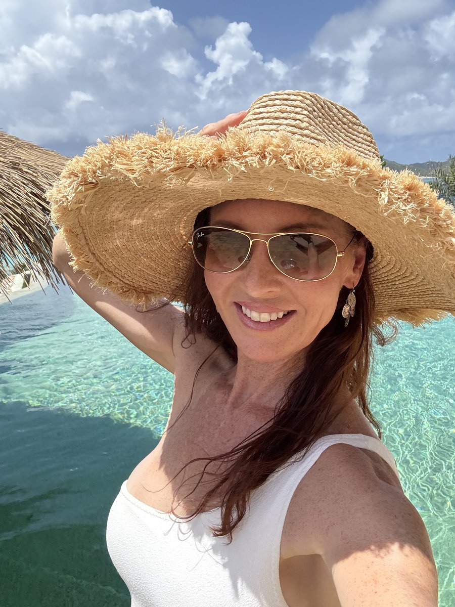 Kylie Schischka by turquoise Caribbean waters